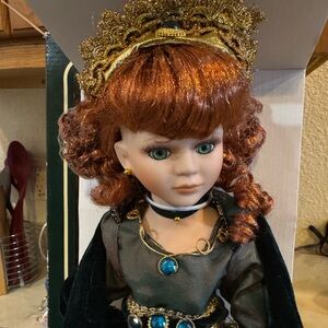 Elegant Doll with Red Hair and Green Dress